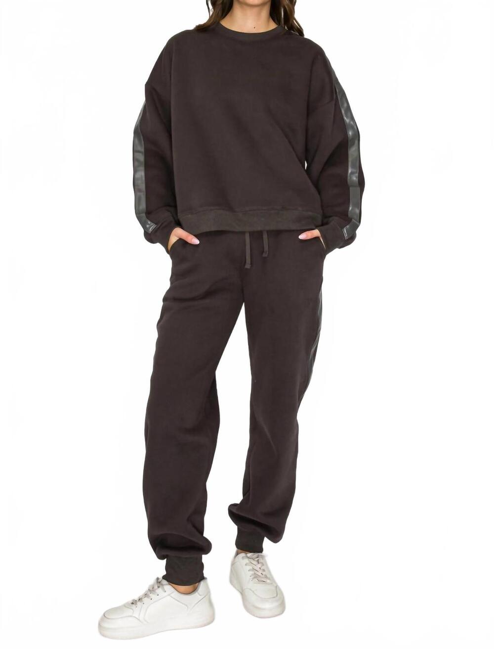NEW KNIT RIOT stride track jogger pants in charcoal